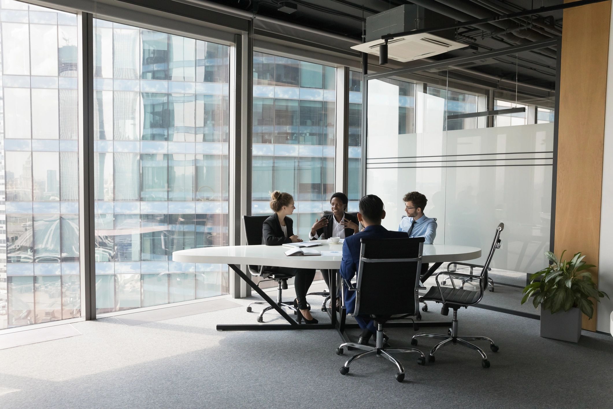 Accounting team collaborating in a meeting room