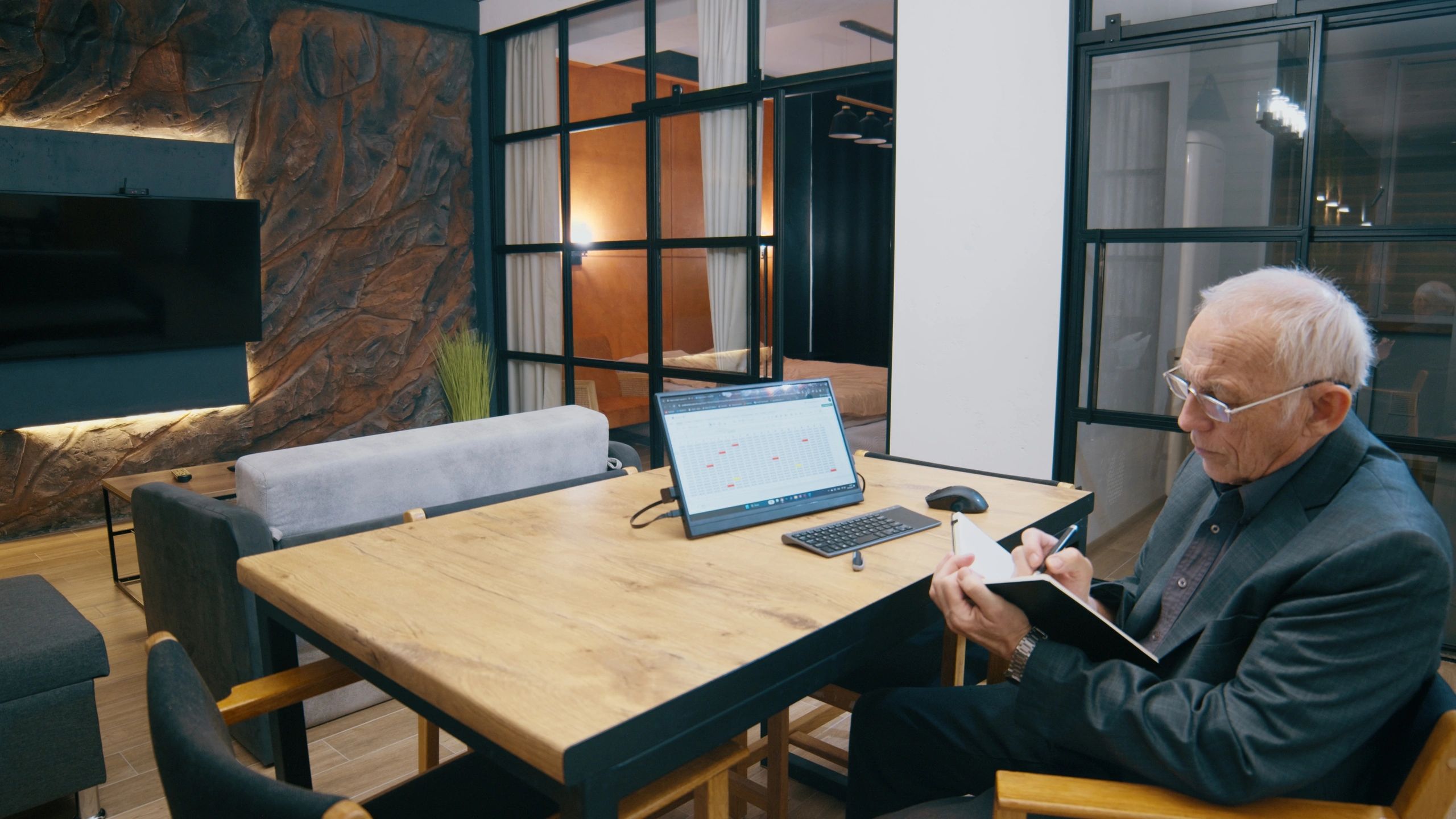 Accounting professional reviewing notes at a desk