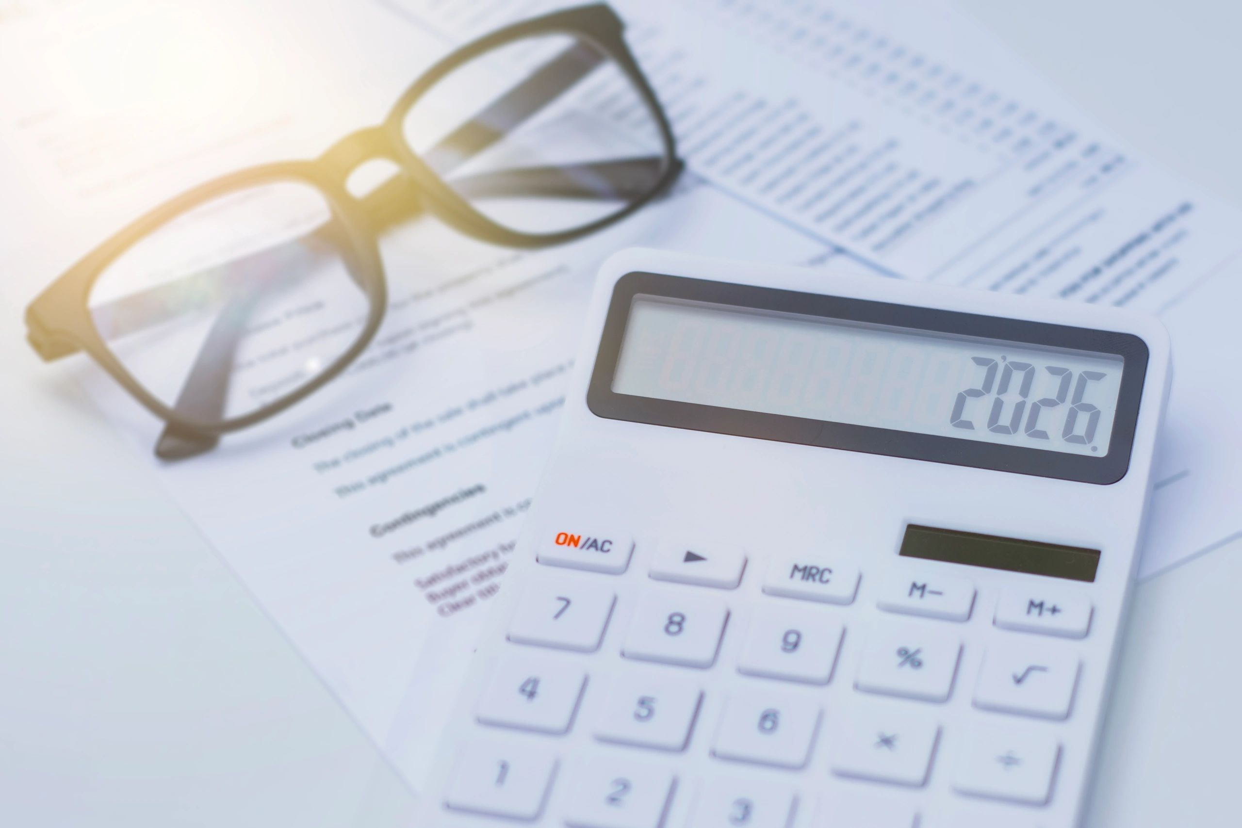 Calculator and financial documents for tax preparation